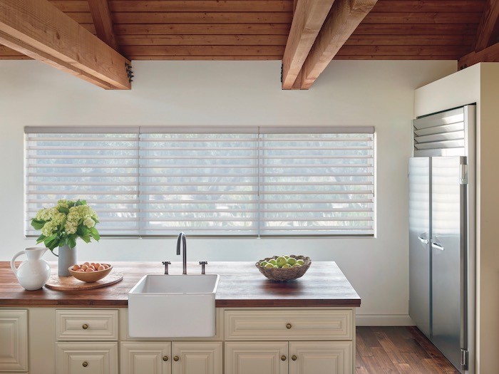 A kitchen island with a sink